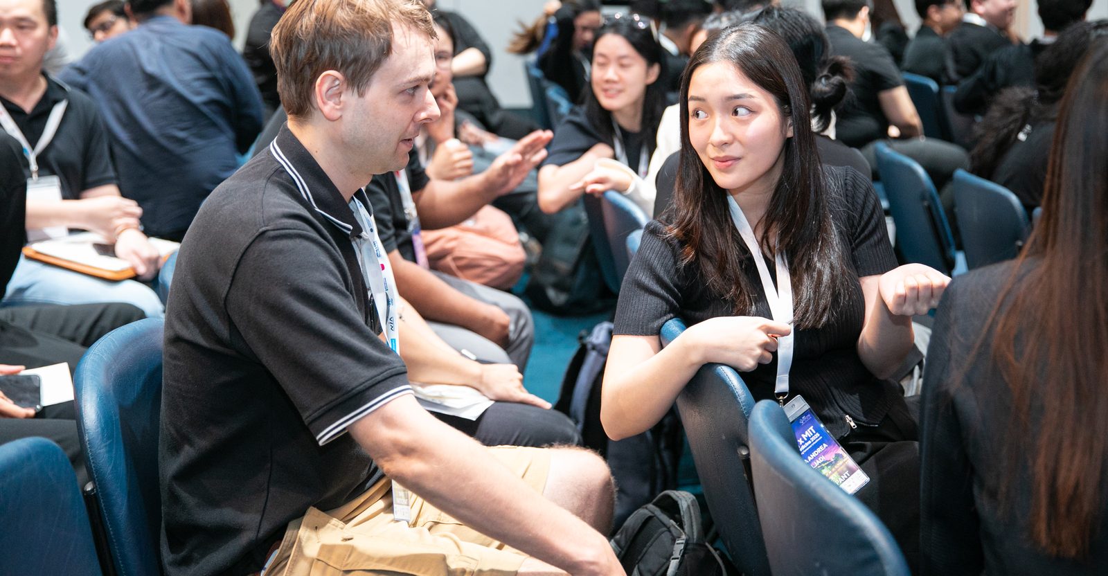 A participant explaining an idea across the table